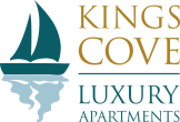 a picture of a sailboat with the words kings cove luxury apartments on a green background